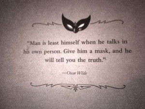 Tattoo quote with masquerade mask