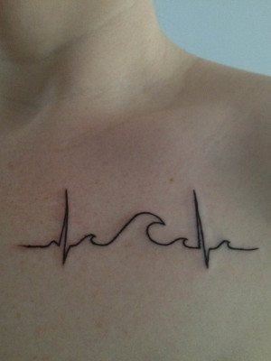 really clever wave heartbeat tattoo on girls chest
