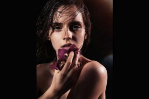 Emma Watson bares it all for James Houston's book Natural Beauty.
