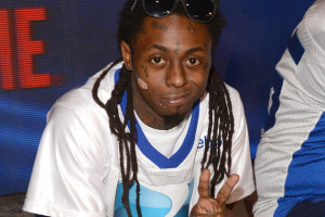 Lil Wayne Attends His Moms...