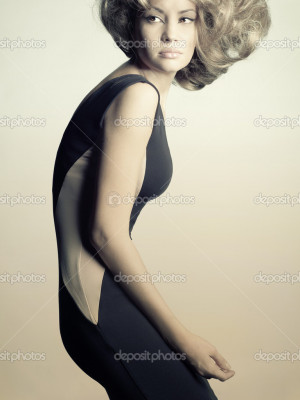 Young beautiful lady in elegant dress - Stock Image