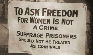 suffragette's protest sign, reading 'To Ask Freedom For Women Is Not ...