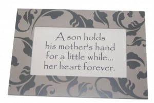 son holds his mother's hand for a little while... her heart forever.