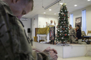 US Army chaplain leads a Christmas service for deployed soldiers in ...