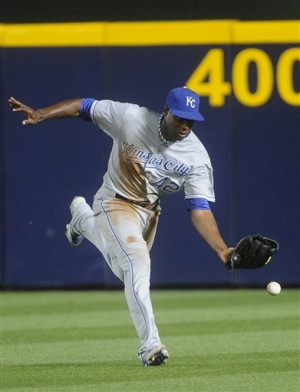 Kansas City Royals center fielder Lorenzo Cain (6) can't catch fly ...