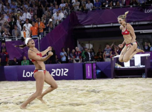 Miss May Treano (l.) and Kerri Walsh Jennings win their third gold in ...