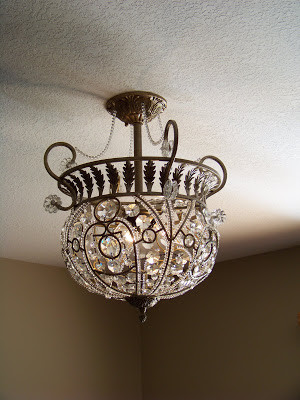 Isn't this the cutest chandelier you have ever seen? My mom gave it to ...