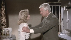Leslie Nielsen as Dr. Rumack in Airplane! (1980)