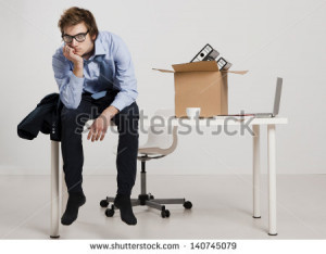 Young Man Sitting The Desk