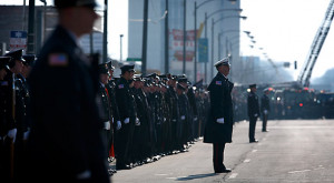 ... funeral for Edward Stringer, a Chicago firefighter killed in the line