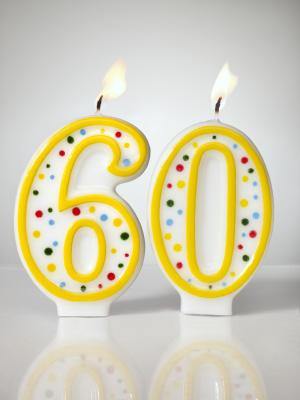 numbered birthday candles aflame shot on white background - Jana Leon ...