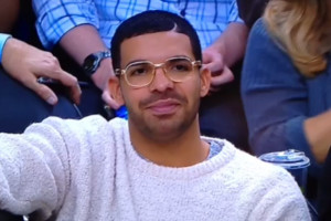 Drake Wears Costanza Glasses and Dad Sweater to Raptors Game