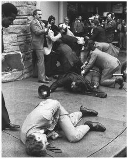 ... in the foreground after shielding President Reagan with his body