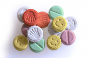 Ecstasy (AKA MDMA, MDA, MDE, Adam, Molly, E, X, Rolls, Beans)