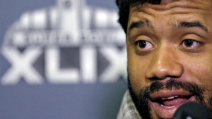 Seattle Seahawks' Russell Wilson answers a question at a news ...