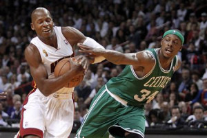 Boston Celtics forward Paul Pierce (R) fouls Miami Heat guard Ray ...