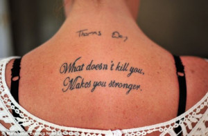 ... of Day's name. It reads: 'What doesn't kill you, Makes you stronger