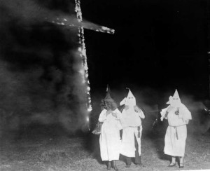 Ku Klux Klan members and a burning cross, Denver, Colorado, 1921