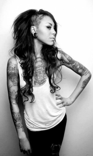 Long messy half-shaven hairstyle