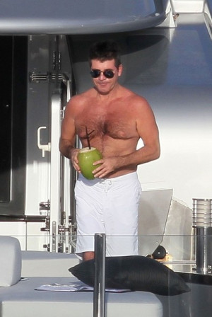 simon cowell plays with fruit in this photo simon cowell simon cowell ...
