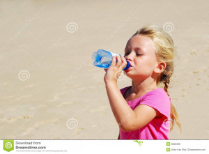 cute little caucasian thirsty girl child drinking still cold water ...