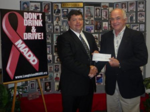 Greenlawn Agent Kidby Donates $500 to Mothers Against Drunk Driving