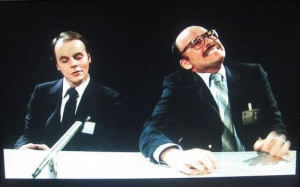 scanners michael ironside grimace pain desk microphone glasses