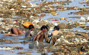 In this picture, people are bathing in the Ganges River, which is ...