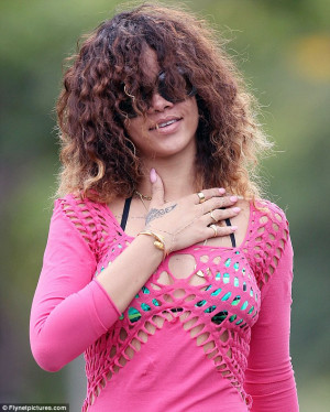 Relaxed: The 23-year-old singer looked happy and relaxed as she made ...