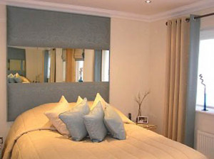 Bed headboard/wall panel with mirror