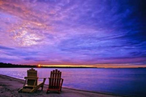 Photo of two beach chairs on Lake Huron with a beautiful sunset in ...