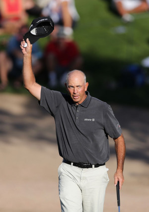 Tom Lehman Tom Lehman waves to the fans on the 18th hole green