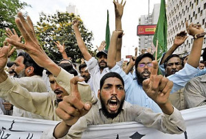 Husband, wife get 25 years for allegedly touching Koran without ...