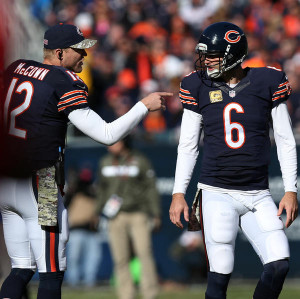 Bears quarterbacks Josh McCown (12) and Jay Cutler (6) talk in the ...