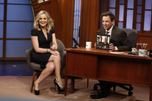 Amy Poehler laughs with the audience as she is interviewed by Seth ...