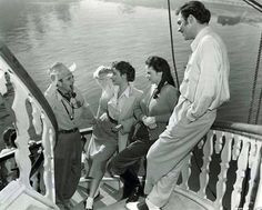 Howard Keel, Kathryn Grayson, Ava Gardner and director George Sidney ...