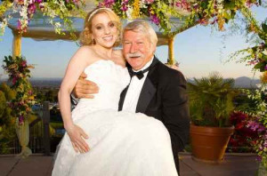 Bela Karolyi Carries Kerri...