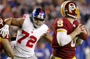 Osi Umenyiora trains with Chuck Smith