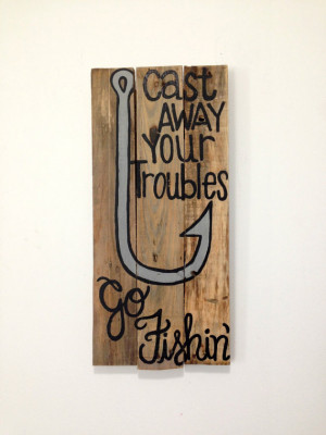 Cute handpainted hook and fishing quote on an upcycled pallet