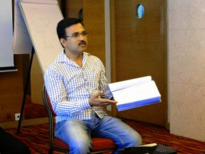 pic shows Thakare explaining his Project Report]