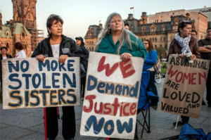 Activists stand vigil on Parliament Hill in Ottawa, 4 October 2012, to ...