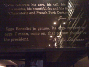 interior walls are covered in mirrors with quotes from famous chefs ...