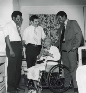 Here you see him laughing at a black woman in a wheel chair, one of ...