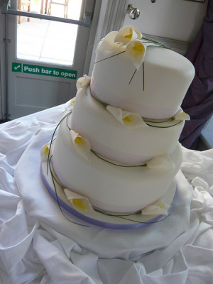 Three Tier Simple White Wedding Cake with Calla Lilies