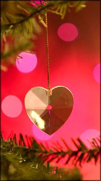 Christmas quotes on love: Golden Christmas heart hanging on Christmas ...