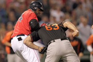 David Ortiz, Kevin Gregg (Photo by Jim Rogash/Getty Images)