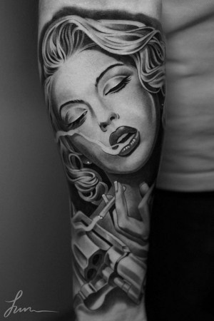 Portrait arm tattoo