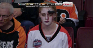 That could be a costume or maybe an errant Claude Giroux shot hit her ...