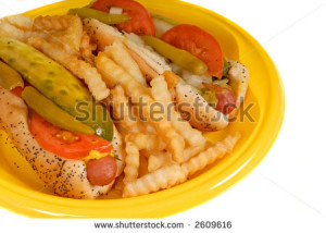 Chicago style hot dogs with french fries on yellow plate I - stock ...