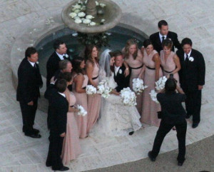 Flanked by bridesmaids and groomsmen, Kate Walsh and Alex Young ...